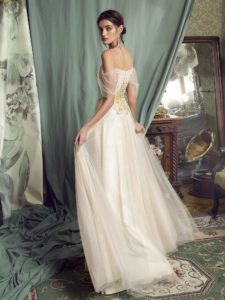 Style #477, A-line evening gown with off-the-shoulder sleeves, available in black, ivory