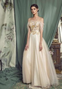 Style #477, A-line evening gown with off-the-shoulder sleeves, available in black, ivory