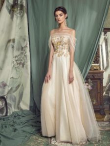 Style #477, A-line evening gown with off-the-shoulder sleeves, available in black, ivory