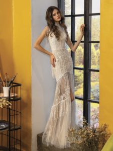 Style #2031L, fit and flare wedding dress with fringe and high neckline, available in ivory