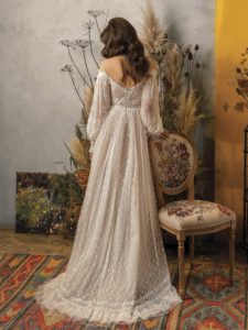 Style #2022L, A-line wedding dress with bishop sleeves, and off the shoulder neckline, available in ivory