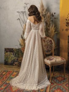 A-line wedding dress with bishop sleeves, and off the shoulder neckline