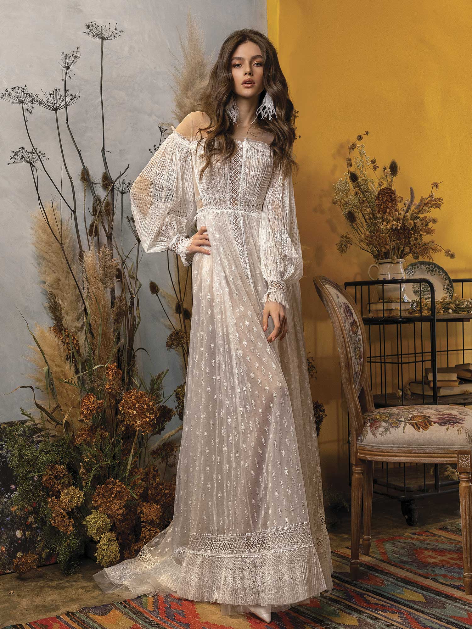 Style #2022L, A-line wedding dress with bishop sleeves, and off the shoulder neckline, available in ivory Style #2022L, A-line wedding dress with bishop sleeves, and off the shoulder neckline, available in ivory