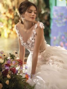 Ball gown wedding dress with floral applique and cap sleeves, available in ivory on nude base, ivory