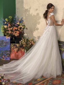 Ball gown wedding dress with floral applique and cap sleeves, available in ivory on nude base, ivory