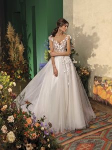 Ball gown wedding dress with floral applique and cap sleeves, available in ivory on nude base, ivory