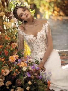 Fit and flare wedding dress with fringe
