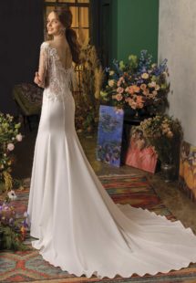Style #2030L, fit and flare wedding dress with fringe, available in ivory