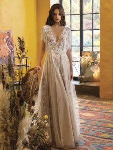 A-line wedding dress with plunging neckline and fringe, available in dark ivory, ivory