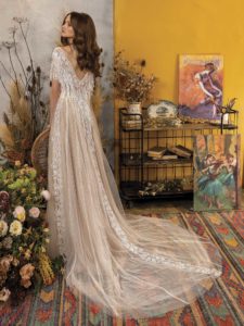 A-line wedding dress with plunging neckline and fringe, available in dark ivory, ivory