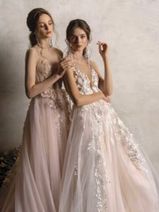 A-line wedding dress with floral applique and A-line wedding dress with plunging neckline