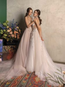 A-line wedding dress with floral applique and A-line wedding dress with plunging neckline