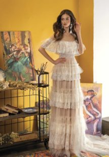Style #2021L, A-line wedding dress with off-the-shoulder neckline and ruffled layers, available in ivory