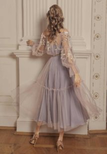 Style #505, off-the-shoulder midi dress with floral embroidery and bishop sleeves, available in powder, grey-pink, nude, peach