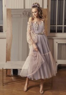 Style #505, off-the-shoulder midi dress with floral embroidery and bishop sleeves, available in powder, grey-pink, nude, peach