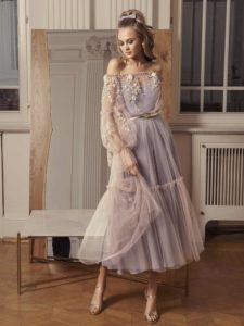 Style #505, off-the-shoulder midi dress with floral embroidery and bishop sleeves, available in powder, grey-pink, nude, peach