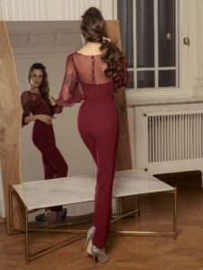 Style #509-8, jumpsuit with bishop sleeves and zig zag embroidery, available in black, powder, burgundy, ivory