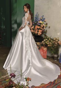 Style #2017L, long sleeved ball gown wedding dress with pockets, available in ivory