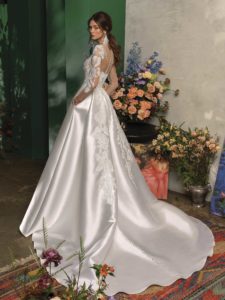 Long sleeved ball gown wedding dress with pockets