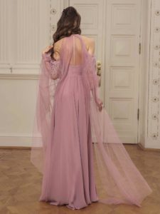 Style #517c, maxi dress with asymmetrical embroidery and deep V back, available in ivory, black, powder, lilac, cherry, grey-light-blue (smoke blue), grey-blue, pink