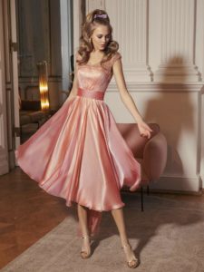 Style #520b, A-line evening gown with unique straps and straight neckline, available in ivory, grey-pink, burgundy, grey, coral