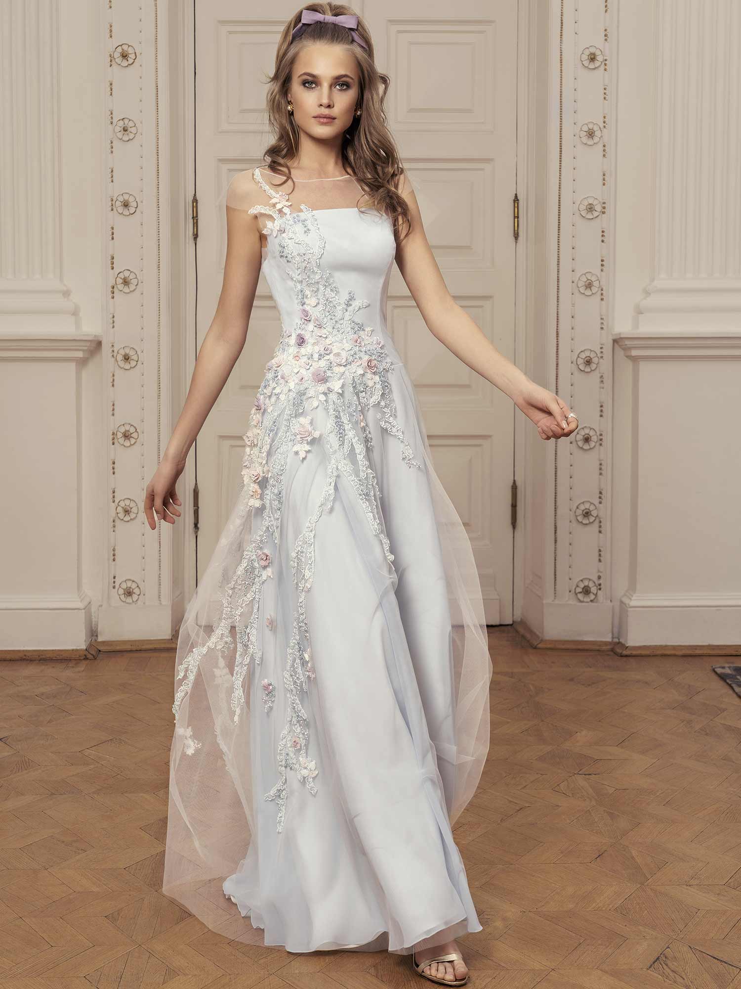 Style #526, maxi dress with sweetheart bodice, zig zag embroidery, and three quarter bishop sleeves with ruffled cuffs, available in ivory, lilac, sky-blue