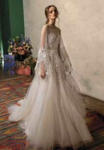 Style #2019L, A-line wedding dress with deep V neckline, illusion panel on the chest, ruched fabric, and floral appliqué, available in ivory