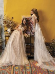 Wedding dress with long sleeves and ruffled skirt