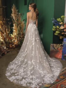 A-line wedding dress with floral applique and ruched bodice