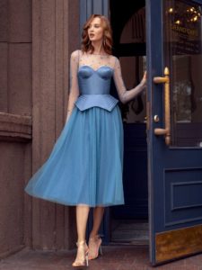 Style #554, formal evening gown with sleeves and structured bodice, available in azure, black, crimson, ivory