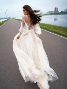 Bridal gown with bishop sleeves and embellished bodice