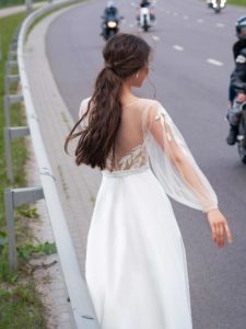 Wedding gown with embroidery and bishop sleeves, available in ivory, ivory-nude