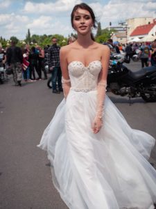 Ultra-modern wedding dress with pearl embellishments, available in ivory, ivory-nude