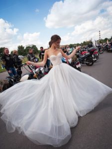 Ultra-modern wedding dress with pearl embellishments, available in ivory, ivory-nude