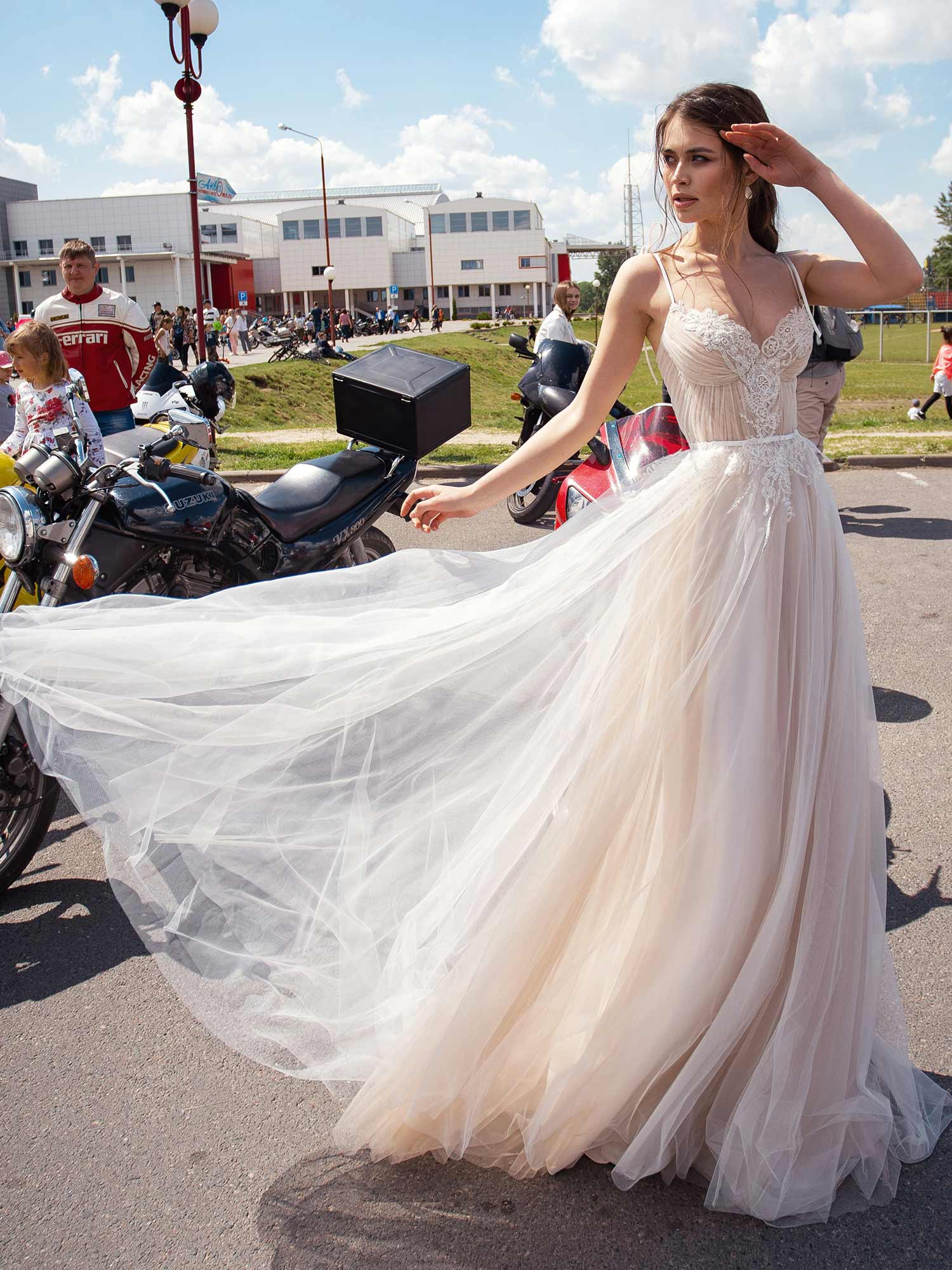 Style #12070, A-line wedding dress with spaghetti straps and embroidered lace, available in ivory, ivory-nude