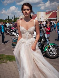 A-line wedding dress with spaghetti straps and embroidered lace, available in ivory, ivory-nude
