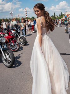 A-line wedding dress with spaghetti straps and embroidered lace, available in ivory, ivory-nude