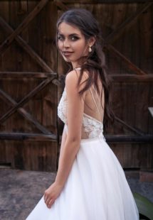 Style #12071, modern wedding dress with floral applique and low back, available in ivory, ivory-nude
