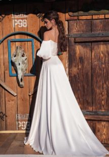 Style #12072, off-the-shoulder wedding dress with bishop sleeves, available in ivory