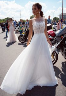 Style #12073a, simple wedding dress with floral applique and pleated skirt, available in ivory, ivory-nude