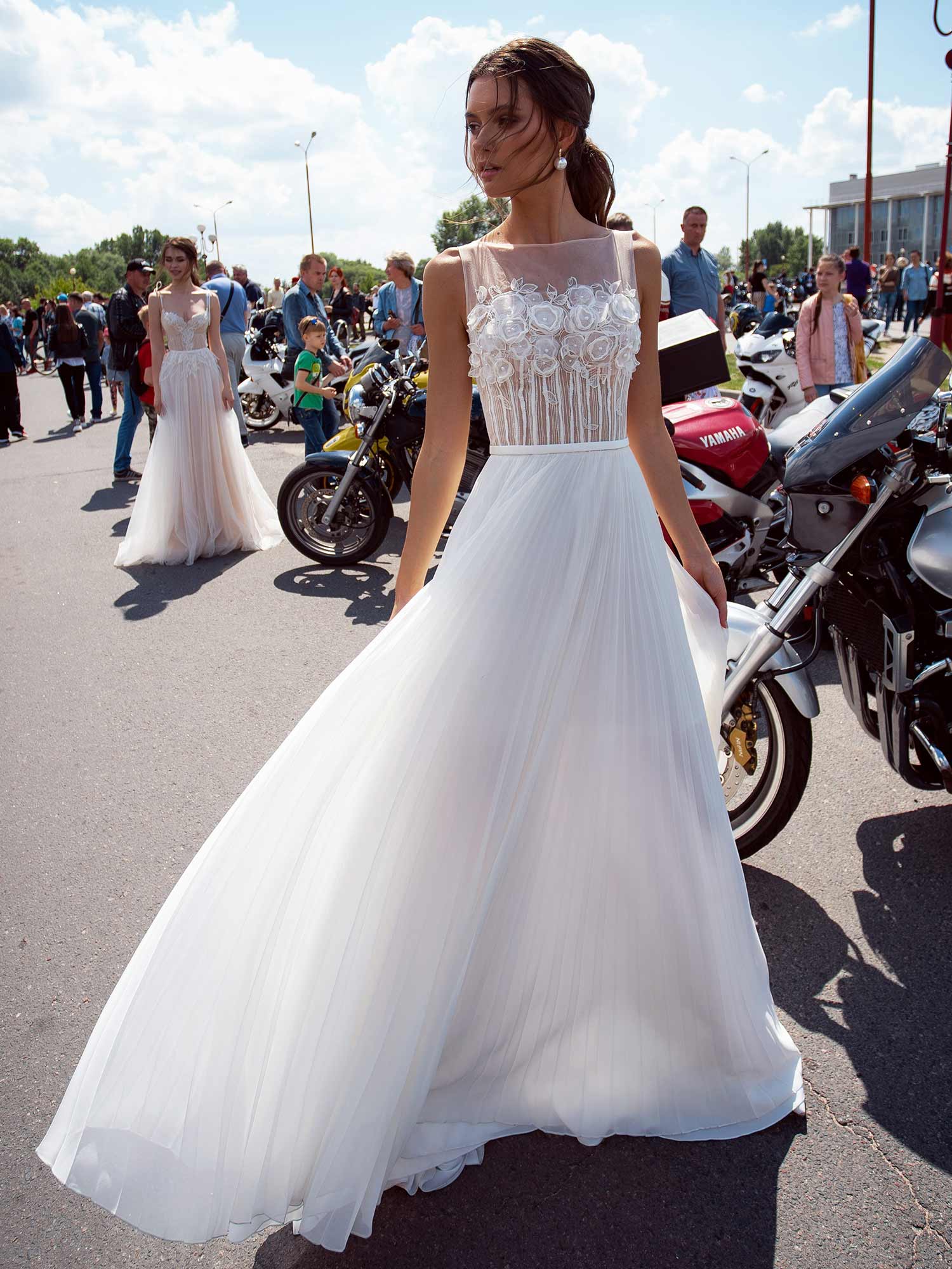 Style #12073a, simple wedding dress with floral applique and pleated skirt, available in ivory, ivory-nude