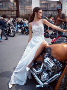 Simple wedding dress with floral applique and pleated skirt, available in ivory, ivory-nude