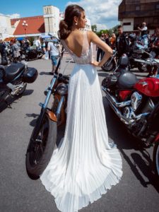 Simple wedding dress with floral applique and pleated skirt, available in ivory, ivory-nude