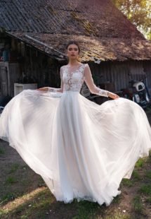 Style #12076, illusion long-sleeved wedding dress with embroidery, available in ivory, ivory-nude