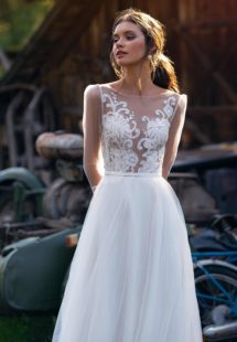 Style #12076, illusion long-sleeved wedding dress with embroidery, available in ivory, ivory-nude