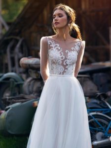 Style #12076, illusion long-sleeved wedding dress with embroidery, available in ivory, ivory-nude