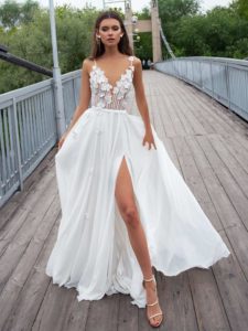 Sheath wedding gown with spaghetti straps and floral embroidery, available in ivory, ivory-nude