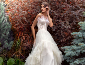 Feather accented wedding dresses