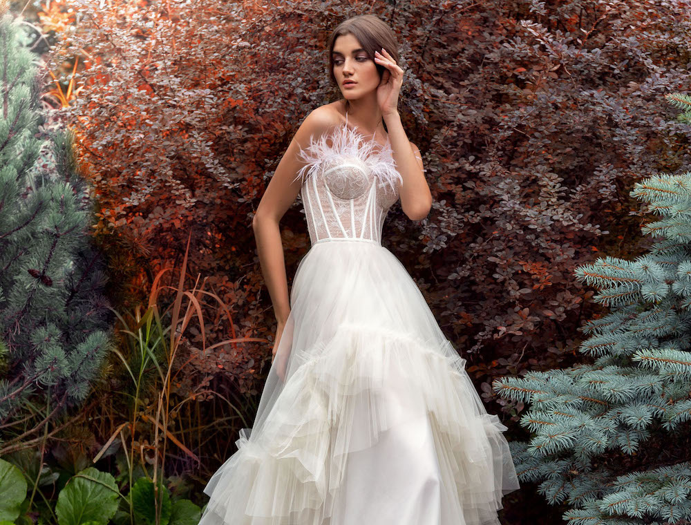 Feather accented wedding dresses Feather accented wedding dresses