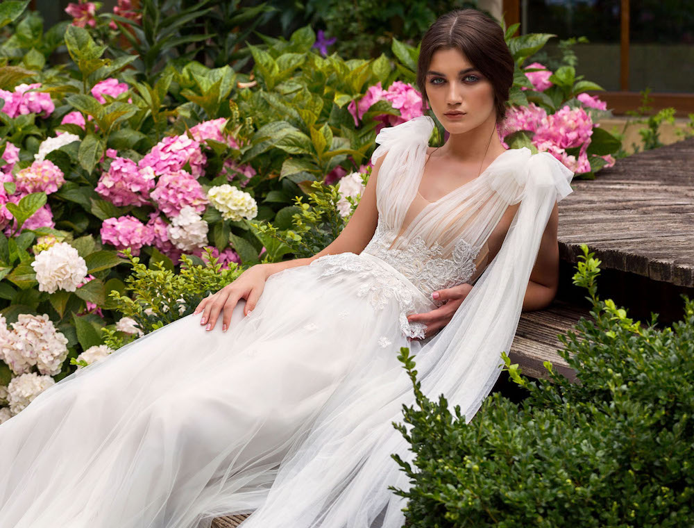 Wedding dresses with statement bow details Wedding dresses with statement bow details